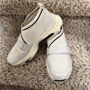 White Steve Madden Slip-On Sneakers with Black Trim